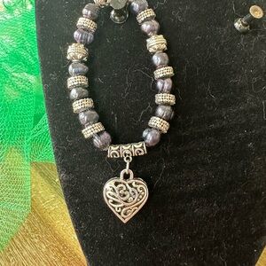 Peacock colored cultured pearls